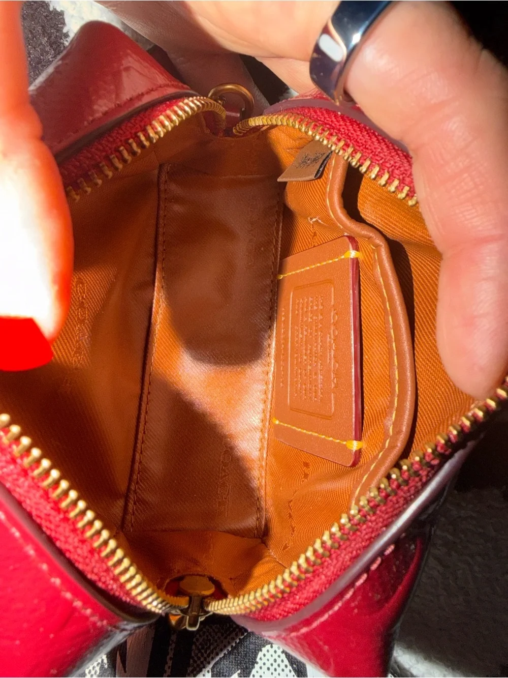 Coach Signature Embossed Cosmetic Pouch in glazed red
